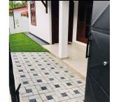 Interlock blocks paving Malaysian Australian grass